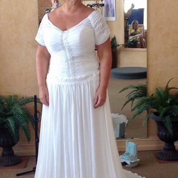 Perfect Fit Alterations - The "before" picture looks frumpy and ill-fitting. The improvement is easy to see with the photos side-by-side. - Bridal Near Me - Fort Myers, Florida Perfect Fit Alterations - The "before" picture looks frumpy and ill-fitting. The improvement is easy to see with the photos side-by-side. - Bridal Near Me - Fort Myers, Florida