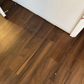 Ashley Store - Multiple Scratches to our floor that need to repair - Furniture Stores Near Me - San Antonio, Texas