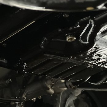 Toyota of North Austin - Underside of truck covered in fresh oil after drain plug left loose - Car Dealers Near Me - Austin, Texas Toyota of North Austin - Underside of truck covered in fresh oil after drain plug left loose - Car Dealers Near Me - Austin, Texas