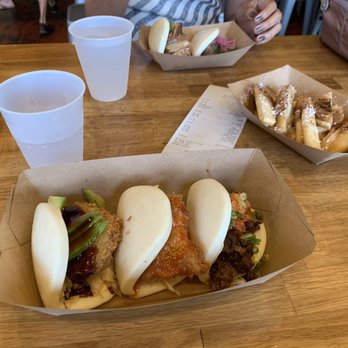 Fat Bao - Pork Katsu, Panko Fish, Bulgogi left to right on my side. Beignet fingers to the right. - Chinese Near Me - Houston, Texas Fat Bao - Pork Katsu, Panko Fish, Bulgogi left to right on my side. Beignet fingers to the right. - Chinese Near Me - Houston, Texas