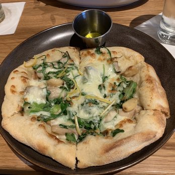 Mahi’ai Table - Hamakua Farms Ali'i Mushroom pizza with truffle sauce on the side. - Cocktail Bars Near Me - Kapolei, Hawaii Mahi’ai Table - Hamakua Farms Ali'i Mushroom pizza with truffle sauce on the side. - Cocktail Bars Near Me - Kapolei, Hawaii