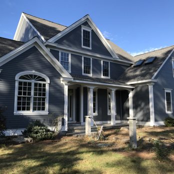 KAJ Construction - After installation of James Hardie 5" exposed lap siding , and James Hardie trim. - Windows Installation Near Me - Framingham, Massachusetts