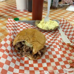 Smokin Barrel BBQ - Brisket sandwich with pickles and onions. Plus side of potato salad.