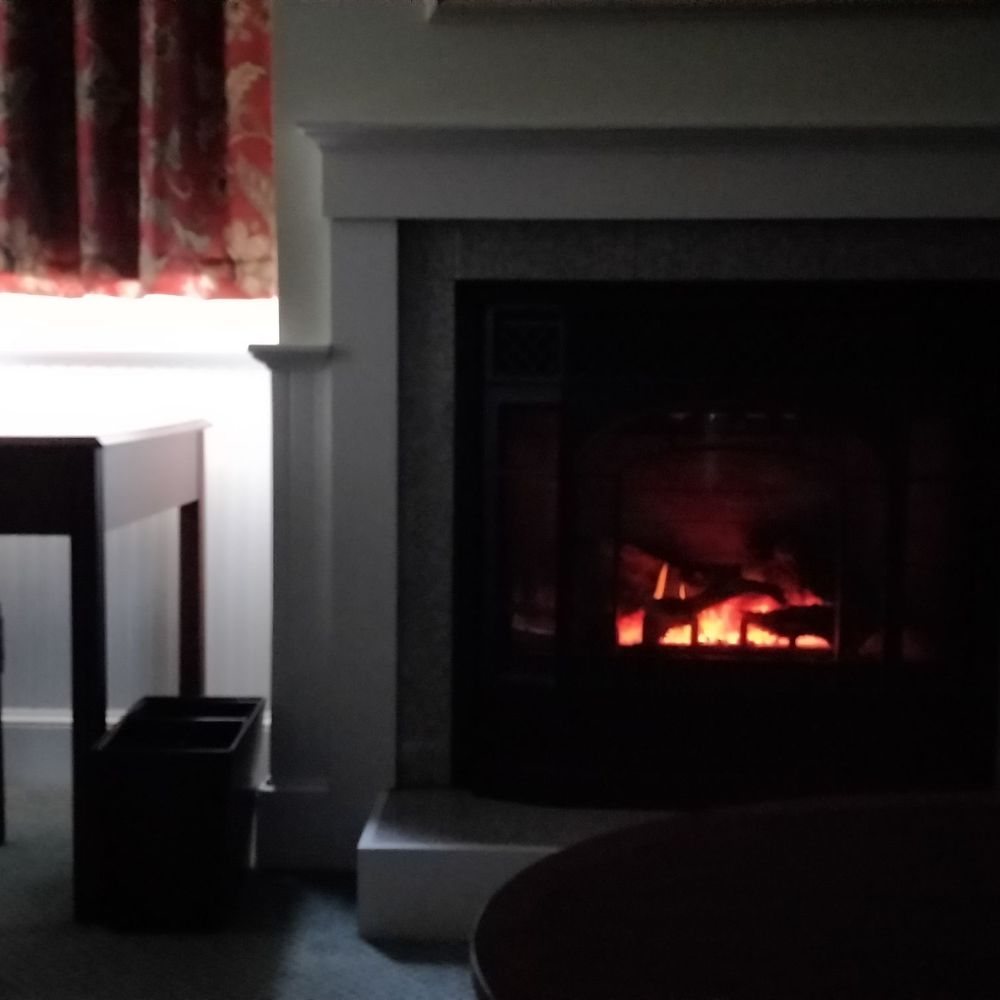 SSHHHH! Quite morning, just relaxing and keeping warm by our fireplace in our room!! This place is great!