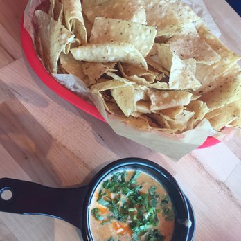 Torchy's Tacos - Chips and queso. It's small. Sad face. - Tex-Mex Near Me - Houston, Texas Torchy's Tacos - Chips and queso. It's small. Sad face. - Tex-Mex Near Me - Houston, Texas