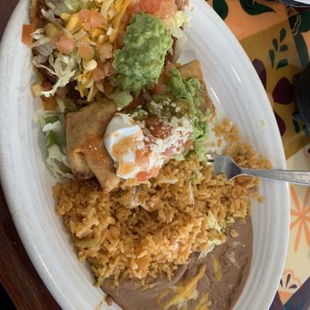 El Molcajete - Tostada and Chimichanga with rice & beans - Mexican Near Me - Ankeny, Iowa