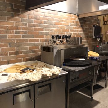 Persian Room Fine Dining - Making their homemade flatbread fresh and hot! - Persian/Iranian Near Me - Tucson, Arizona