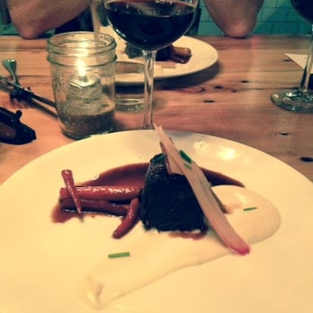 Dancing Marlin - Braised short ribs with glazed baby carrots, turnips, pickled rhubarb, braising liquid reduction, and white chocolate puree. - New American Near Me - Frankfort, Illinois
