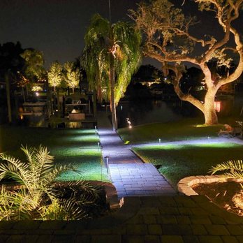 Omni Irrigation - a pathway in a park at night - Landscaping Near Me - Tampa, Florida Omni Irrigation - a pathway in a park at night - Landscaping Near Me - Tampa, Florida