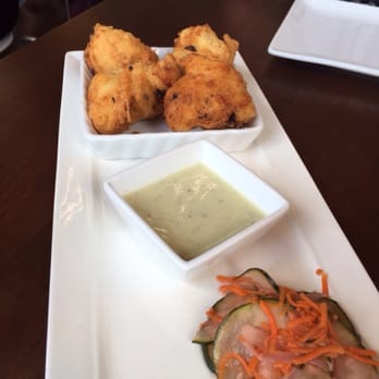 Four Friends Kitchen - Cheese & chorizo beignets - Southern Near Me - Denver, Colorado Four Friends Kitchen - Cheese & chorizo beignets - Southern Near Me - Denver, Colorado