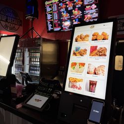 ATL Wings - AZ3320 - Self service kiosk. "Please use kiosks!! *if paying cash let us know, but exact change"