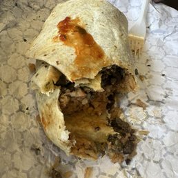 Took a pic of my husband's burrito which was 1/2 eaten before I could get a pic.  Lots of meat and filling.