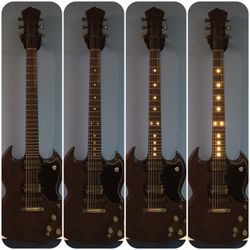Stonewall Instruments "Filthy Guitar". Yes, those are LEDs in the fingerboard.