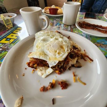 Don's Country Kitchen - Classic Stuffed Hash Browns, with Sausage, Cheddar and Onions, topped with two Fried Eggs. - Breakfast & Brunch Near Me - Carlsbad, California Don's Country Kitchen - Classic Stuffed Hash Browns, with Sausage, Cheddar and Onions, topped with two Fried Eggs. - Breakfast & Brunch Near Me - Carlsbad, California