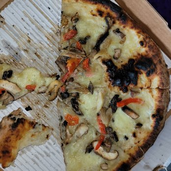 Coratti's Pizzeria Bar and Bocce - Mushroom and pepper.  Greasy and burned. - Italian Near Me - Howell, Michigan