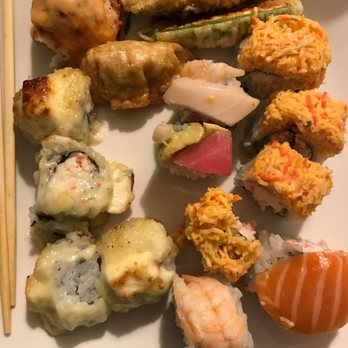 Tengoku Sushi - Generous portions, even for takeout! Clockwise: stuffed jalapeños, Sexy Boy, Rainbow, Japanese Lasagna, potsticker, mushroom caps - Japanese Near Me - Henderson, Nevada