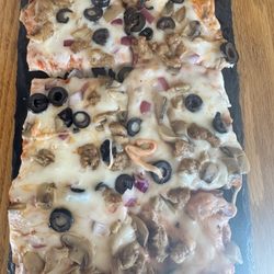 Second Chance Coffee and Music - 2nd chance coffee and music flatbread pizza with mushrooms, black olives, sausage and onions. And ohhhh the cheese!!!! Delicious!