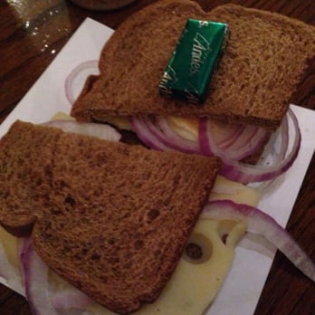 Baumgartner's Cheese Store & Tavern - Half Swiss on rye, Half Limburger rye sammy served with an Andes mint. - Cheese Shops Near Me - Monroe, Wisconsin Baumgartner's Cheese Store & Tavern - Half Swiss on rye, Half Limburger rye sammy served with an Andes mint. - Cheese Shops Near Me - Monroe, Wisconsin