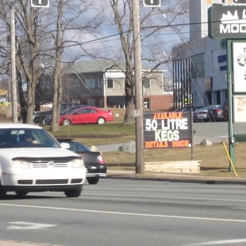 Moosehead Cold Beer Store - a car driving down the street - Breweries Near Me - Dartmouth, Nova Scotia