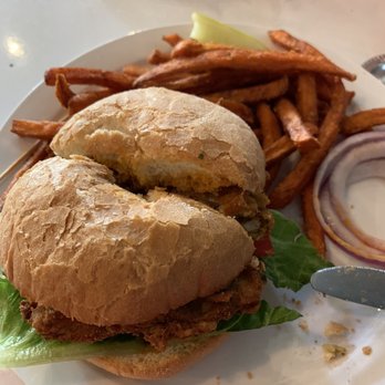The Owlery Restaurant - My chicken (tofu) sandwich with buffalo sauce - Vegan Near Me - Bloomington, Indiana The Owlery Restaurant - My chicken (tofu) sandwich with buffalo sauce - Vegan Near Me - Bloomington, Indiana