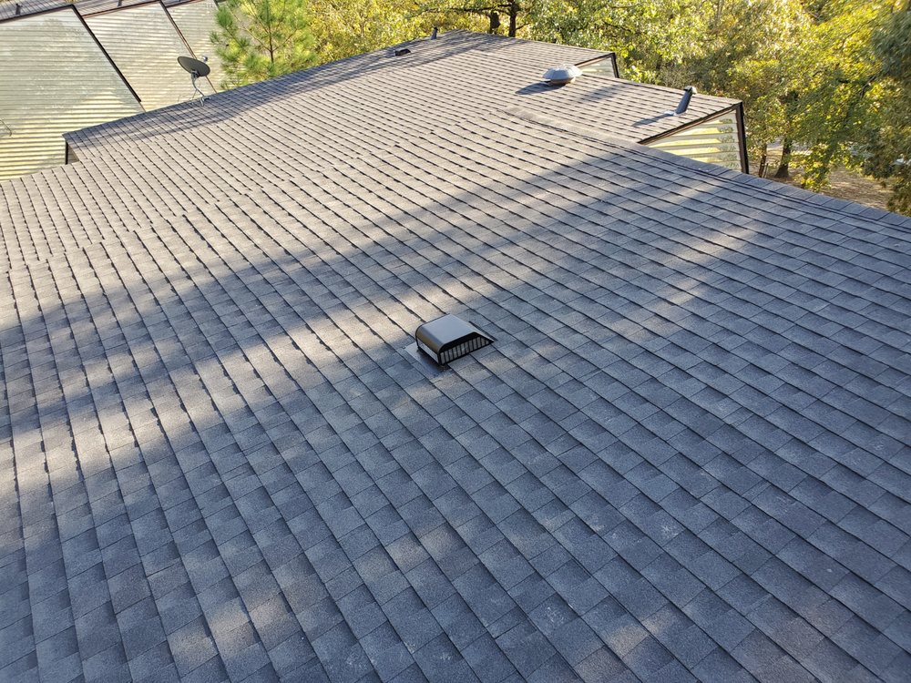 Slide of Einstein Roofing