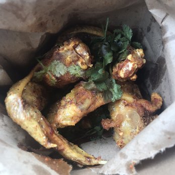 Nudi - Devil wings. Tangy, spicy dry rub, with cilantro and red onion sauce. Yum! - Asian Fusion Near Me - Portland, Oregon
