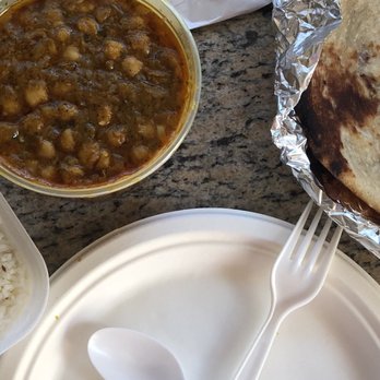 India Gate Restaurant - Rice, garbanzo and potato and pea stuffed naan. - Indian Near Me - Bellevue, Washington India Gate Restaurant - Rice, garbanzo and potato and pea stuffed naan. - Indian Near Me - Bellevue, Washington