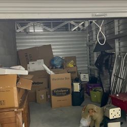 Save Green Self Storage - This is a picture of someone else's stuff in 1110 that I've been paying for for several years.