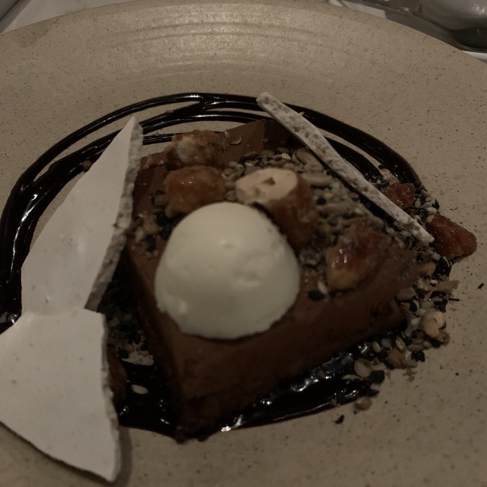 the Albert - Dark chocolate mousse with candied cashews and meringue - New American Near Me - Chicago, Illinois the Albert - Dark chocolate mousse with candied cashews and meringue - New American Near Me - Chicago, Illinois