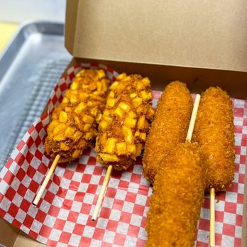 Manna - a box of fried food on a table - Korean Near Me - Mississauga, Ontario Manna - a box of fried food on a table - Korean Near Me - Mississauga, Ontario