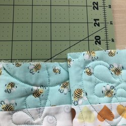 Quilter's Cottage - Quilt trimmed incorrectly