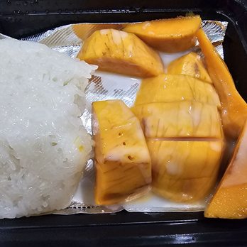 Dancing Spoons - Already took a bite but mangos are kind of old - Thai Near Me - San Gabriel, California