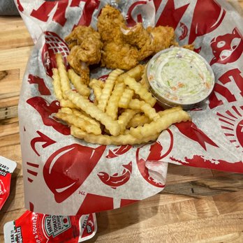 Raising Cane's Chicken Fingers - The box combo comes with 4 chicken strips and fries as well as Coleslaw and a drink for $8.49 as of 11-28-21 - Chicken Shop Near Me - Fairview Heights, Illinois Raising Cane's Chicken Fingers - The box combo comes with 4 chicken strips and fries as well as Coleslaw and a drink for $8.49 as of 11-28-21 - Chicken Shop Near Me - Fairview Heights, Illinois