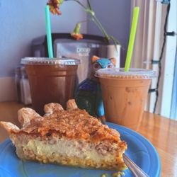 Cups Espresso & Cafe - Quiche, iced americano, and iced hedgehog