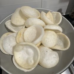 Mandarin Court Takeaway - The burnt prawn crackers. You can see how brown they are.