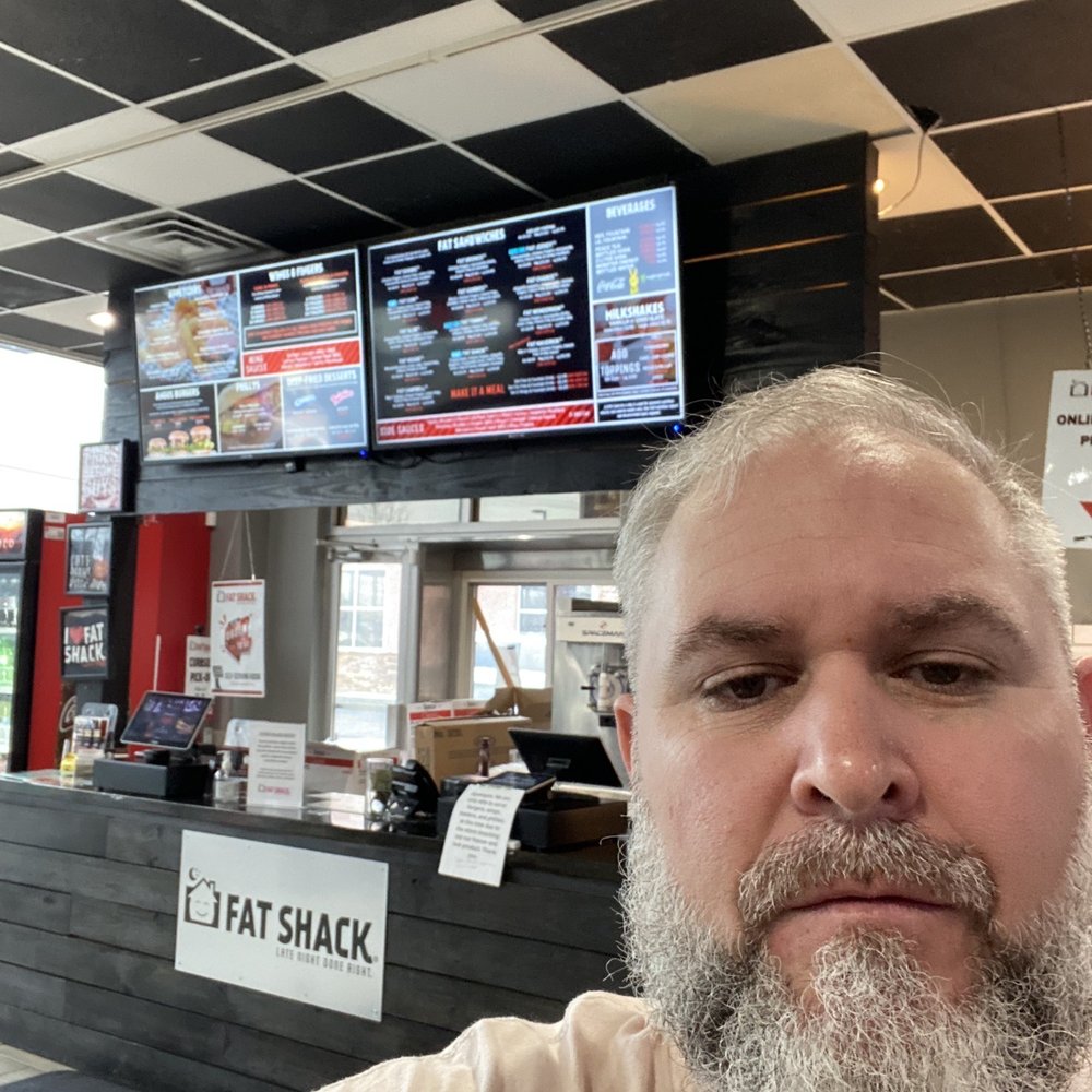 Their ordering counter. Nice menu display screens to make it easy to view while waiting in line.