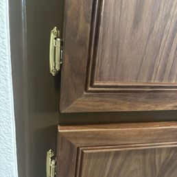 Installed large cabinet doors.