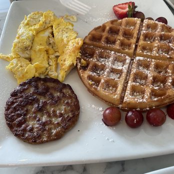 WeCare Salon Cafe - Waffle platter with and my hubby's two sides were scrambled cheese eggs and sausage. - Cafes Near Me - Virginia Beach, Virginia WeCare Salon Cafe - Waffle platter with and my hubby's two sides were scrambled cheese eggs and sausage. - Cafes Near Me - Virginia Beach, Virginia