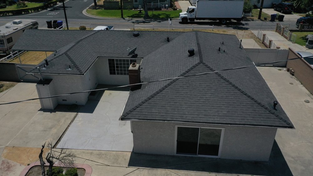 Slide of Trmj Roofing