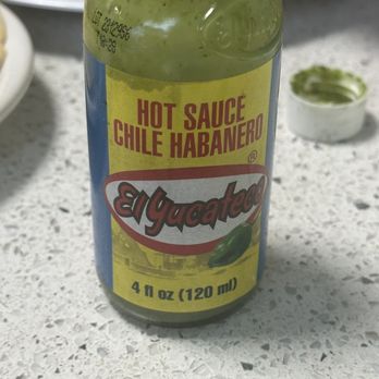 Corinto Restaurant - a bottle of hot sauce - Mexican Near Me - District Heights, Maryland