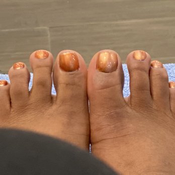 Nails by Crystal - Weird orange color. Uneven edges. This is how I left the salon the day before - Nail Salons Near Me - Austin, Texas
