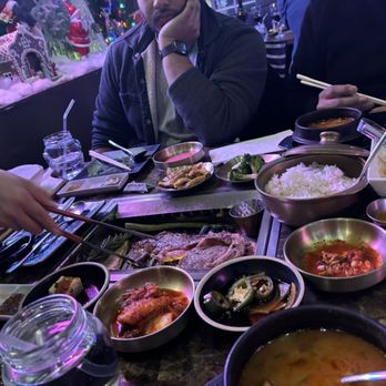 Woodam - Our dinner getting cooked by one of the cook. - Korean Near Me - Morris Plains, New Jersey Woodam - Our dinner getting cooked by one of the cook. - Korean Near Me - Morris Plains, New Jersey