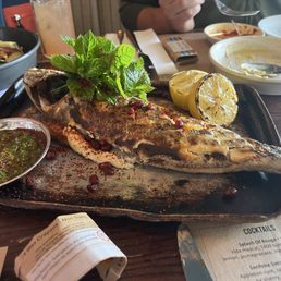 Whole grilled sea bass
