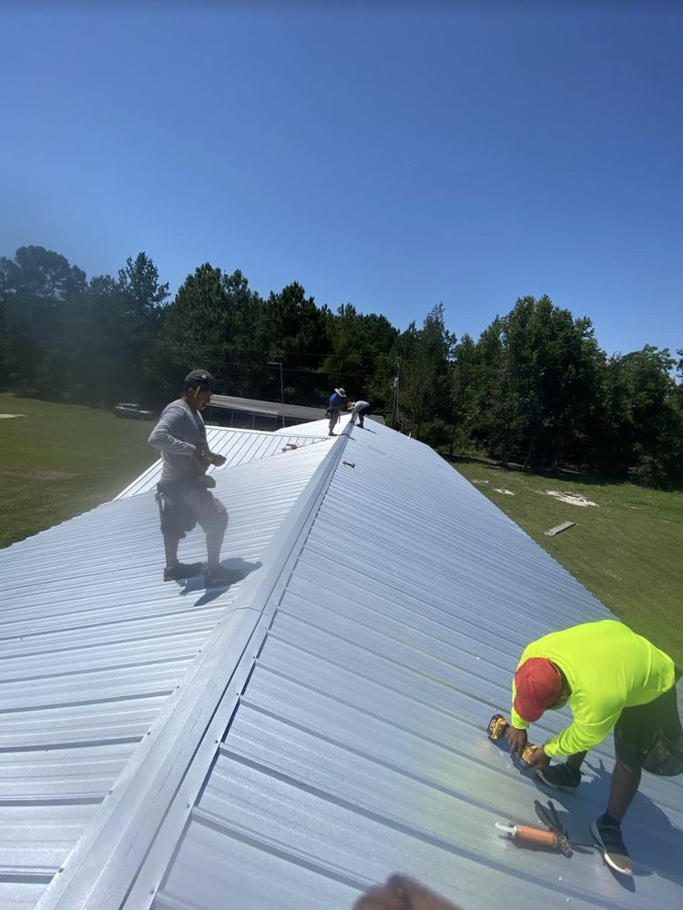 Slide of Tyndal Roofing