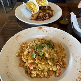 Pier 101 - Migas with crawfish (front) and breakfast tacos with potatoes (back) - Seafood Near Me - Rockwall, Texas Pier 101 - Migas with crawfish (front) and breakfast tacos with potatoes (back) - Seafood Near Me - Rockwall, Texas