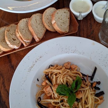 Benitto's - Table bread with salmon pasta - Italian Near Me - Puerto Vallarta, JAL