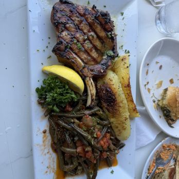 Rafina Greek Taverna - Pork Chop and potato - Greek Near Me - Boca Raton, Florida Rafina Greek Taverna - Pork Chop and potato - Greek Near Me - Boca Raton, Florida