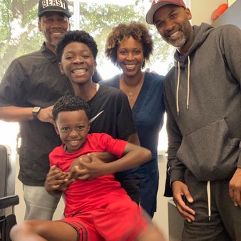 Lined Up - Karis Stoudamire-Phillips, visiting with sons Michael and Tyson, accompanied by (cousin) Eric LaVon Mashia. - Barbers Near Me - Addison, Texas