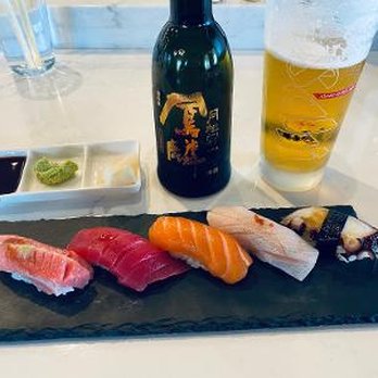 Edoko Omakase - From L to R Toro, Tuna, Salmon, (amberjack maybe I forgot) and Octopus.  All fresh and Delicious - Sushi Bars Near Me - Irving, Texas