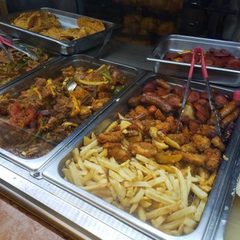 Midway Deli - a variety of food in trays - Grocery Near Me - Roosevelt, New York